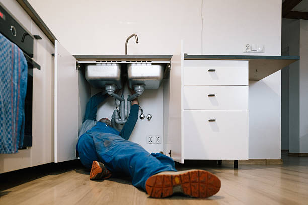Professional Drain Cleaning technician working in Cambria Heights, NY